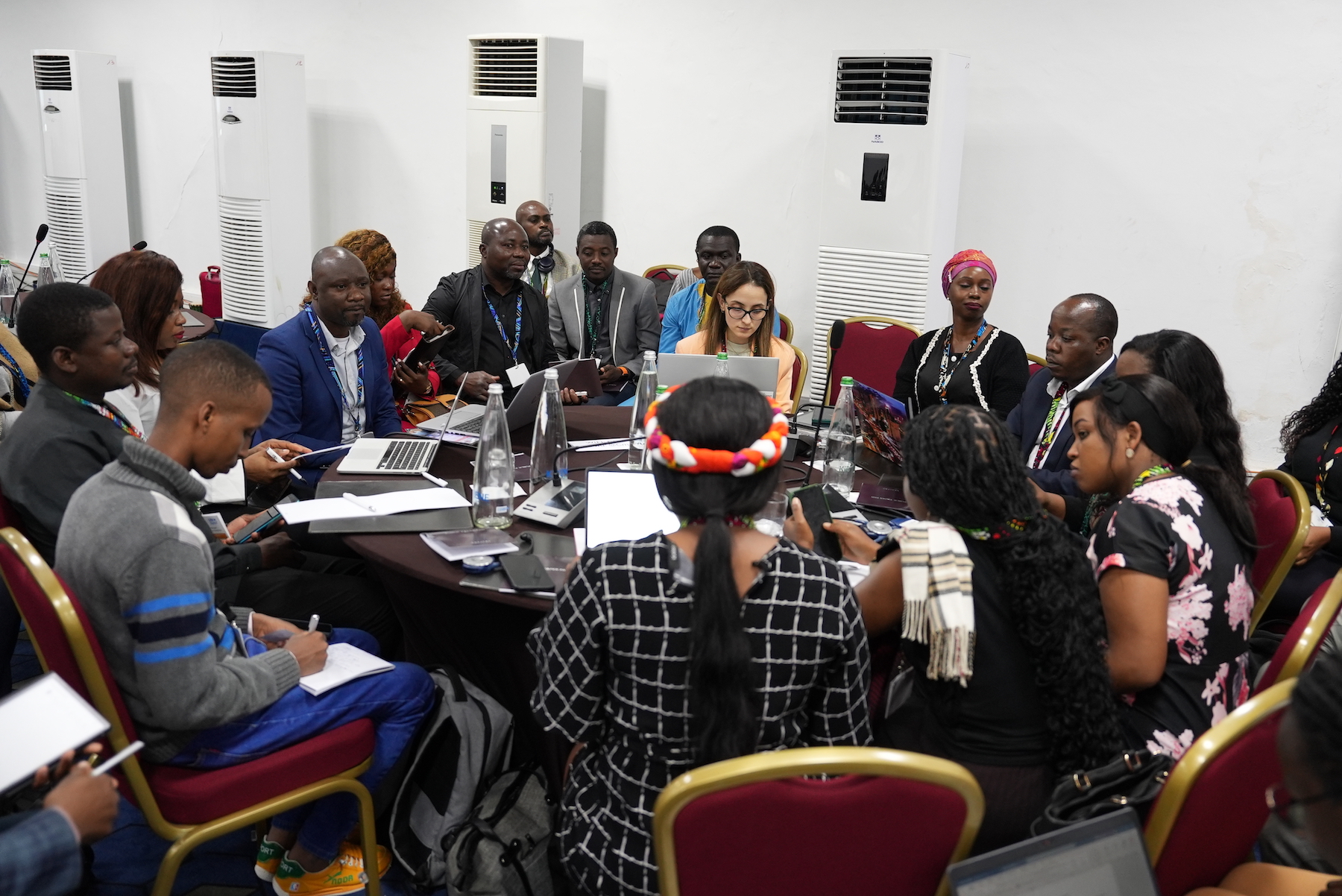 Civil society members discuss during the 10th AMCEN regional consultative meeting on September 2, 2024. Image by Thomas-Diego Badia for Mongabay.