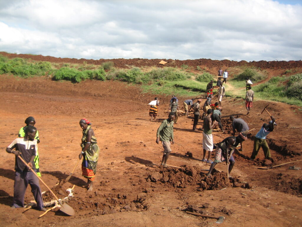 Workers dig a pond to store water in drought-stricken Oromia region, Ethiopia, in 2012. Image by UNDP Ethiopia via Flickr (CC BY-NC-ND 2.0).